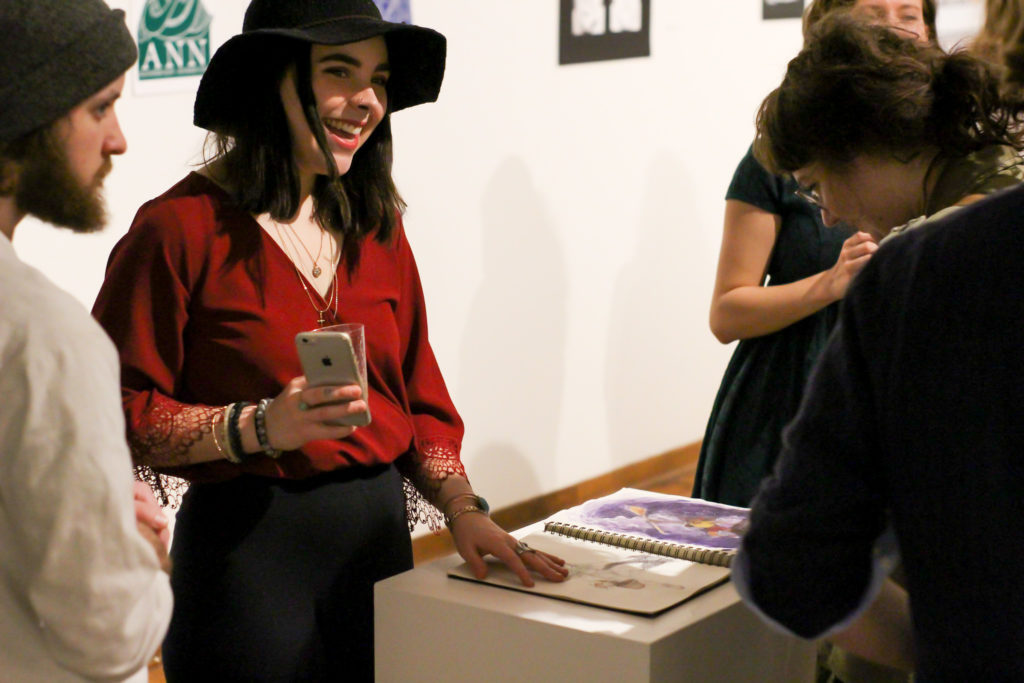 Female student enjoying the gallery