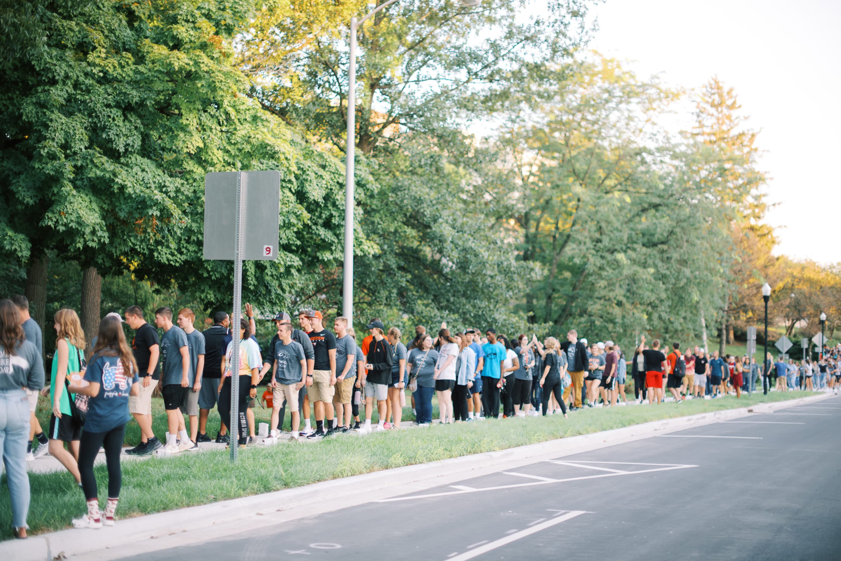 Students walking to the rock
