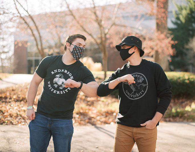 Two students wearing masks in the Valley at Anderson University in Indiana.
