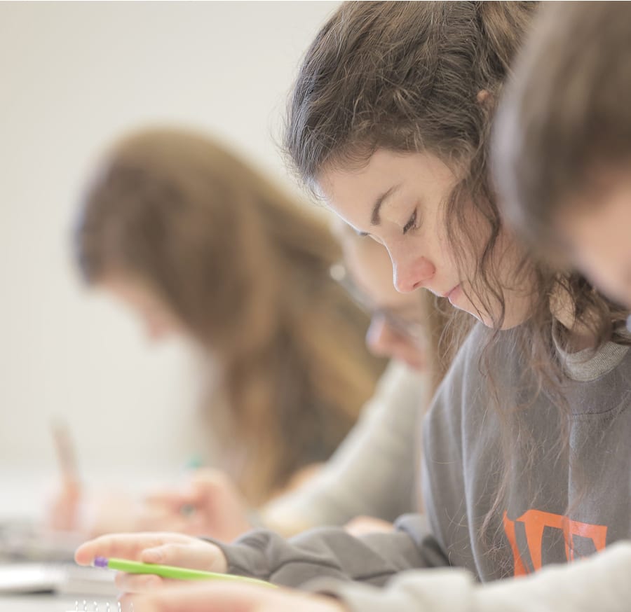 Female student taking a test.