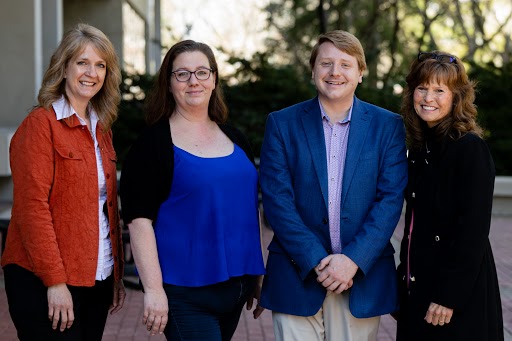 Dawn Carr, Tri Kappa Scholarship Chair; Brandi Foley; Brent Beggs; Stephanie Moran, AU Director of Engagement and Adult Studies