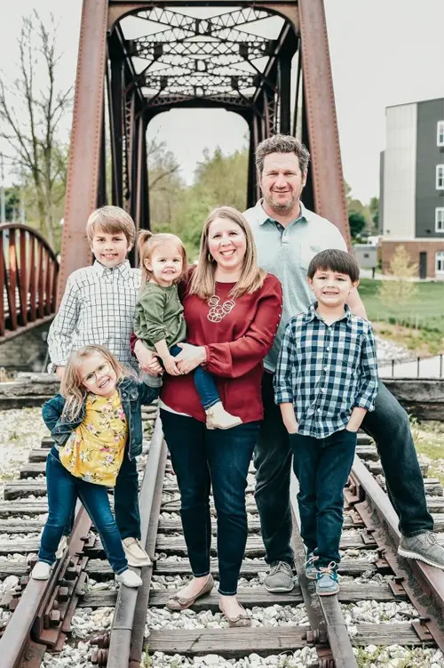 Tracy Horrell is pictured with his wife and children.