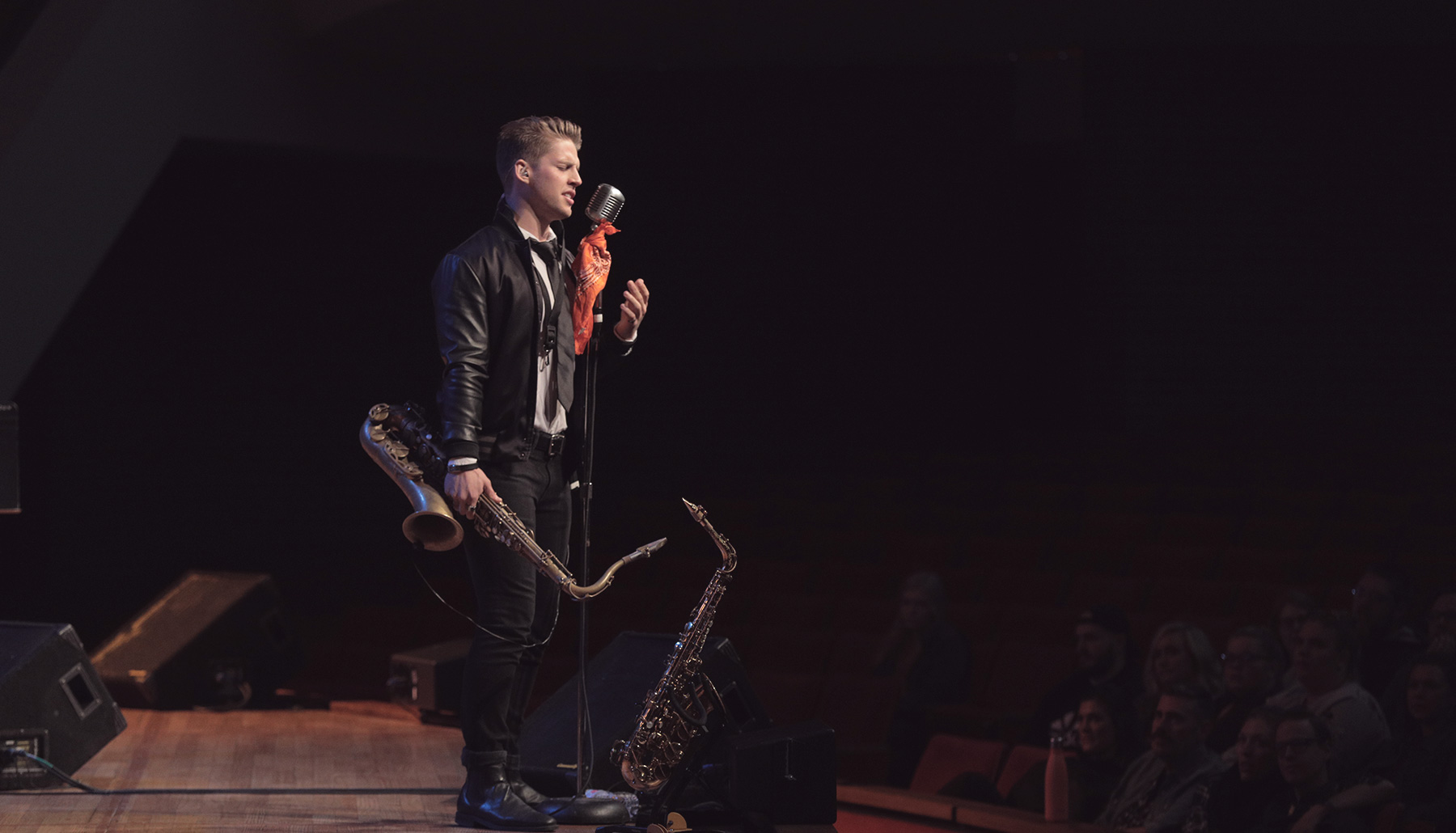 Solo saxophone player onstage
