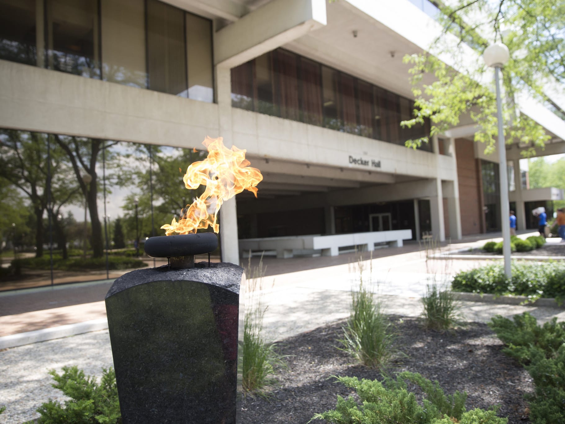 eternalflame Flame outside of Decker Hall on a sunny day.