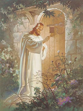 Christ knocking on a door with white bright clothes